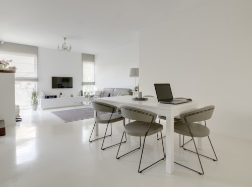 image of modern white dining and living room